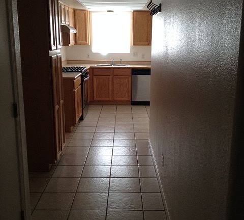 Hallway leading to kitchen