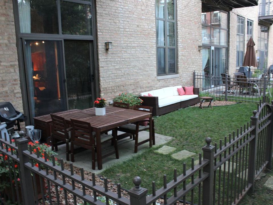 Fenced Yard Overlooking Koi Pond