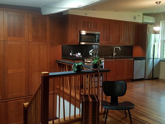 Skylight over stair (3-pane), new kitchen and cabinets. Refinished hardwood floors