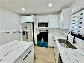 4131 NW 11th Pl — Photo 7