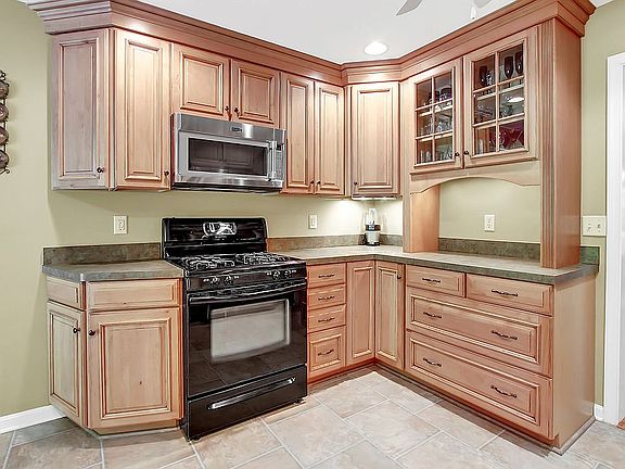 Gleaming maple cabinetry