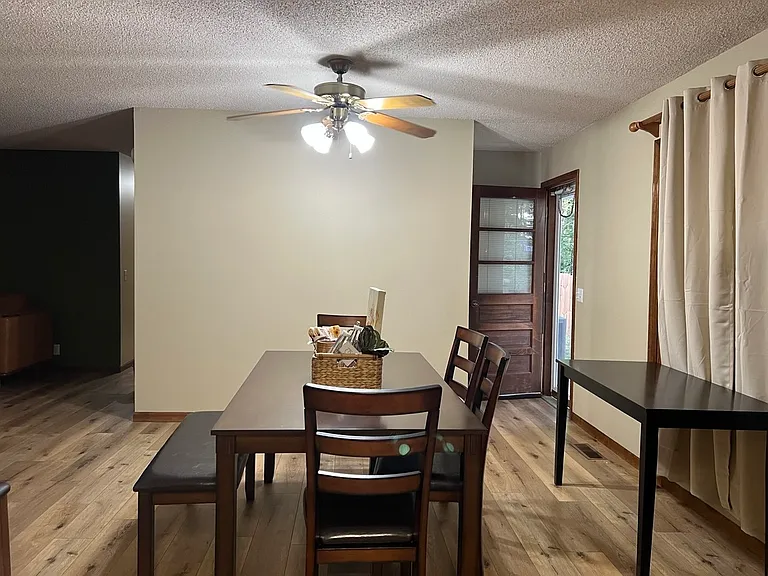 Dinning Area with door leading to the spacious backyard