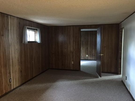 Living room area looking into 2nd bedroom
