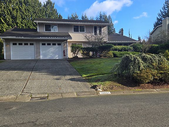 Driveway allows for plenty of parking as well as street parking if needed. The Garage includes an EV charger.