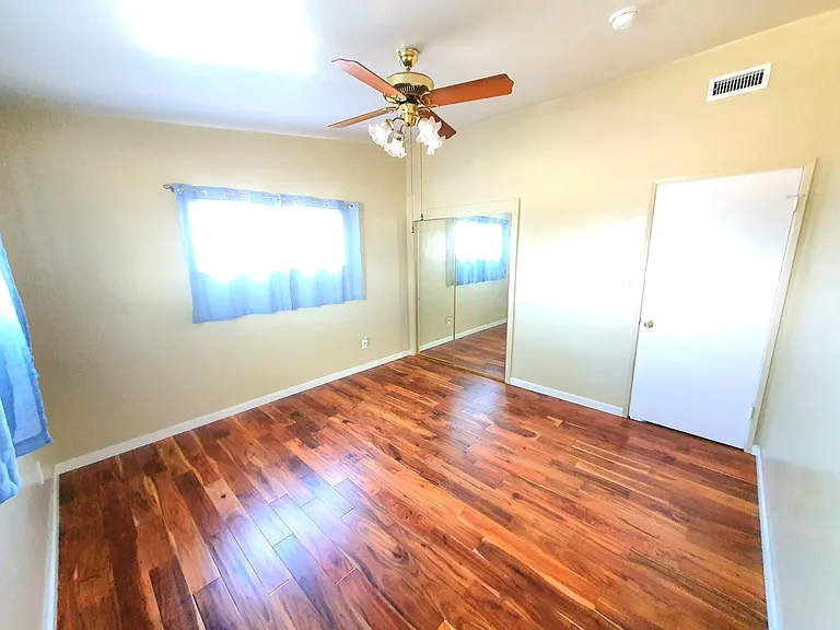 Master's bedroom with closet (behind the mirror)
