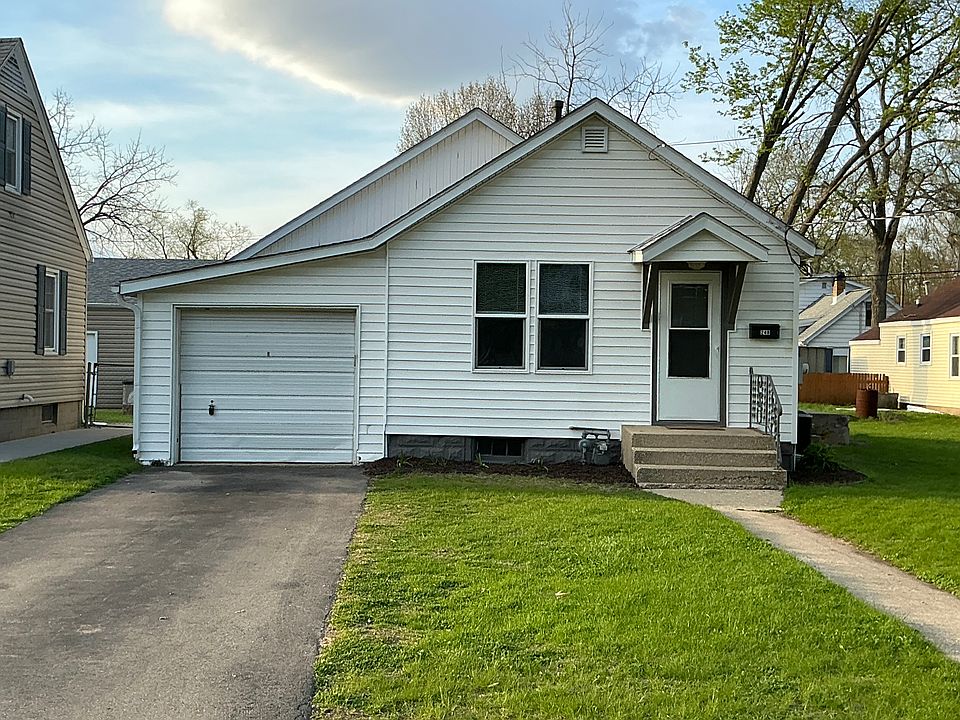 Front view of home, with attached garage