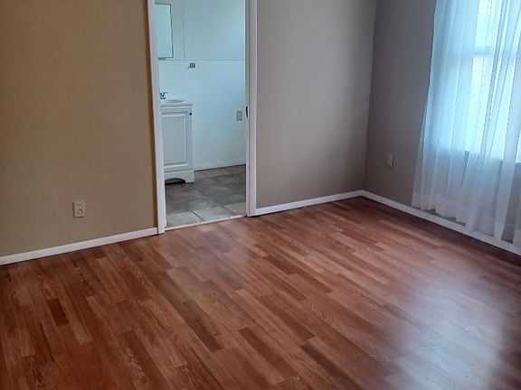 Bedroom with view of half bath