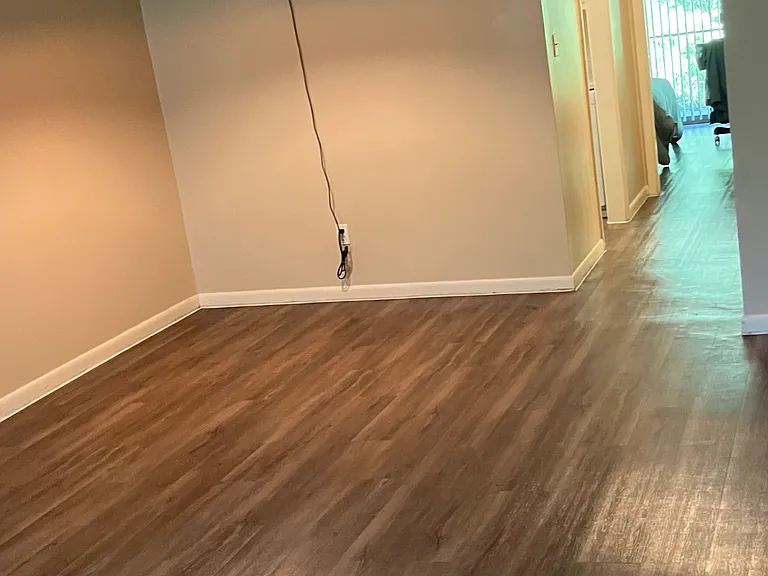 Living room with hallway to bedroom