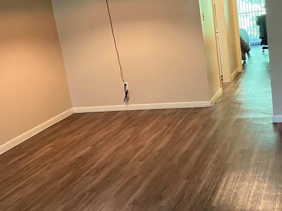 Living room with hallway to bedroom