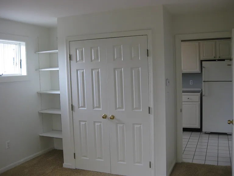 bedroom with dbl closet & built ins