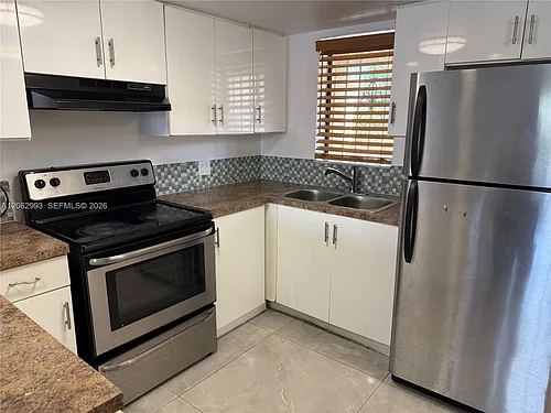 5530 W 26th Ct #210 Photo 1