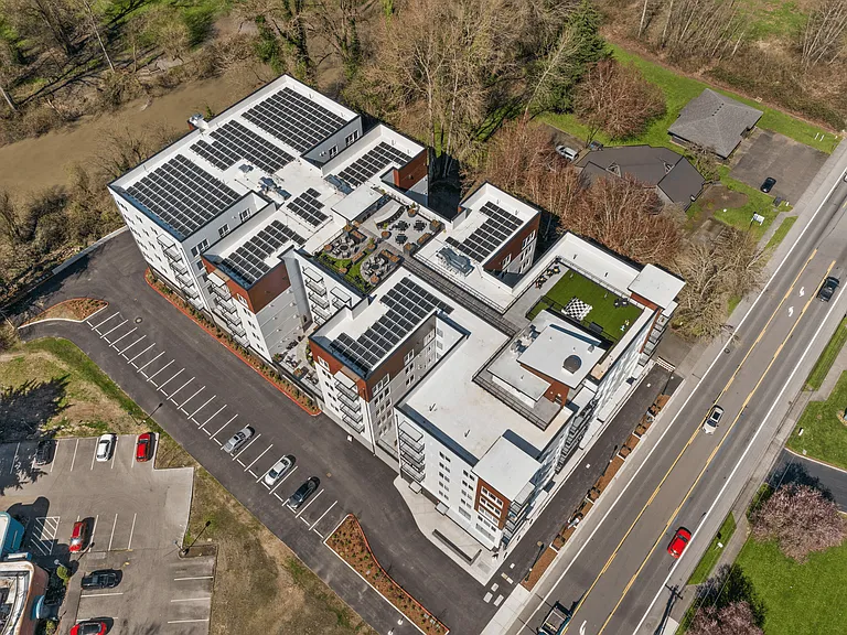 Fryar Flats Apartments in Sumner, WA combining modern living with eco-friendly solar energy and rooftop amenities.