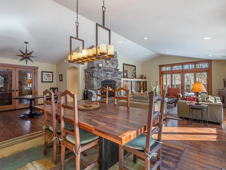 Dining area is fully equipped with linens, dishes, glasses, barware and cutlery