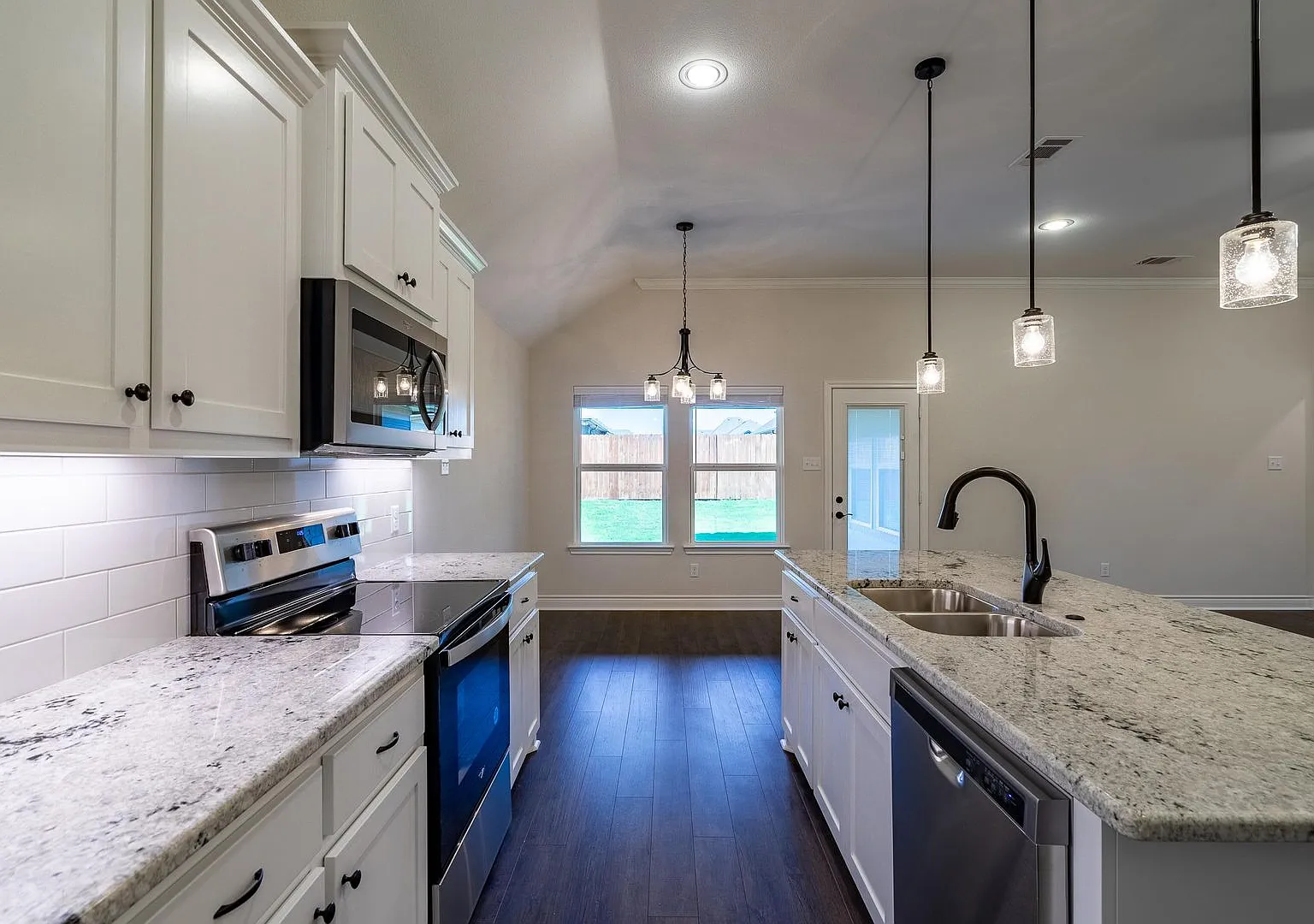 Modern Open-Concept 3-Bedroom Home with Premium Upgrades & Private Suite — Photo 4