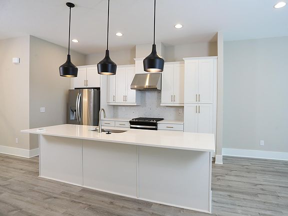 Kitchen with super large island with quartz countertop