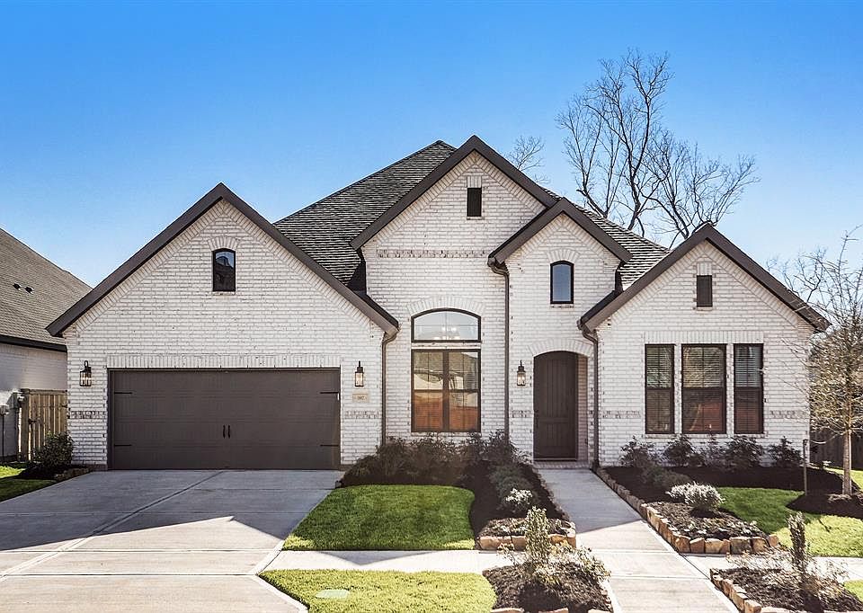This absolutely stunning one-story brick home is filled with high-end decorator touches throughout. This fabulous open floor plan offers a private study, elegant formal dining room, large game room, incredible family room with a cathedral ceiling, be