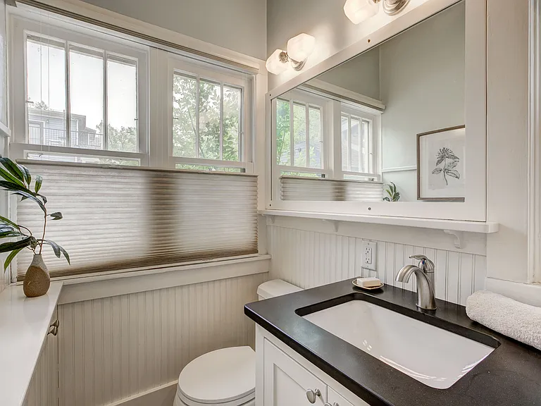 bathroom with new sink & counter + custom storage on opposite wall