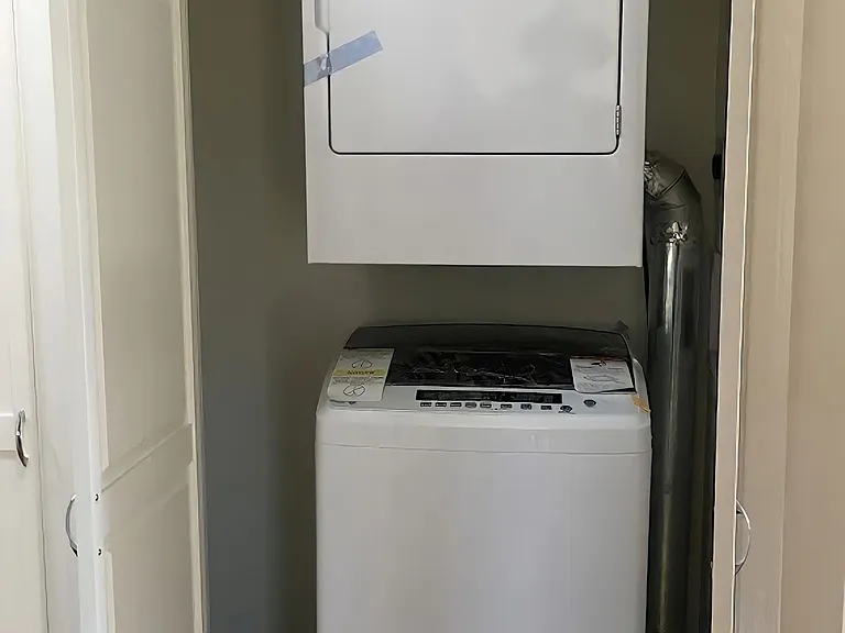 Washer and dryer in hallway.