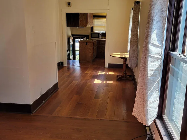 Dining room between living room and kitchen
