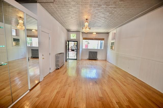 Living Room with original stamped tin ceiling.