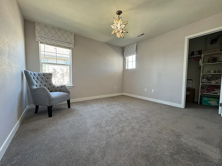 Upper floor - Guest Bedroom 2 with walk-in closet
