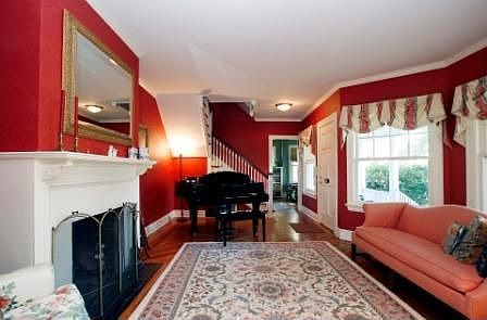 Parlor with woodburning fireplace