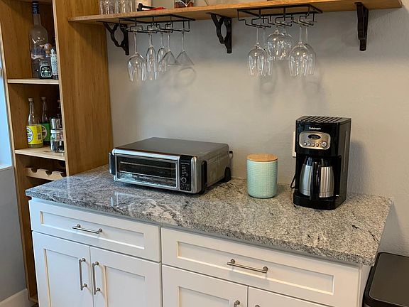 Bonus counterspace in kitchen, wine glass shelf included