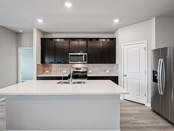Cook a delicious meal in this beautiful kitchen.