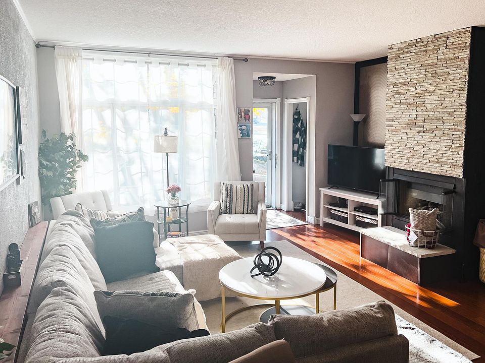 Open concept with hard flooring throughout the main level and modern, updated finishes