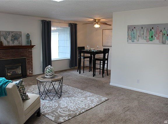 Another view...this was taken from the front entry looking into the living room to the dining area.