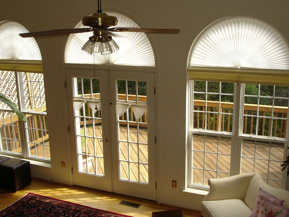 Living room w/palladin windows & 13 ft ceilings