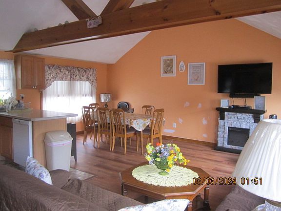 Recently placed new flooring in the open space (Kitchen, Living Room and Dining room)