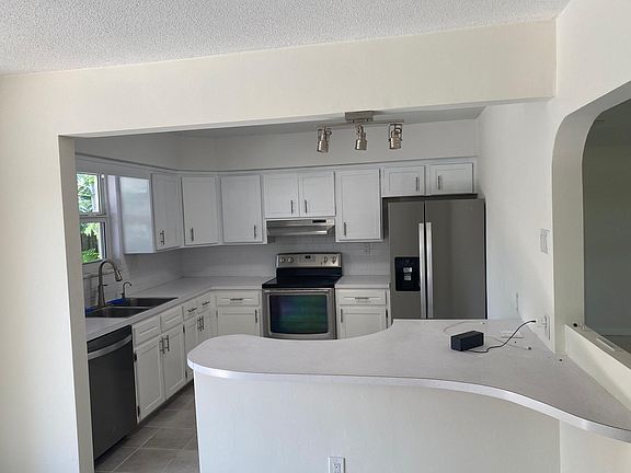 Newly remodeled kitchen with new stainless steel appliances.