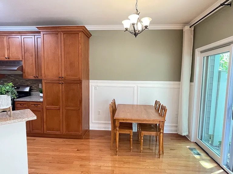 Sunny breakfast nook with inviting everyday dining space