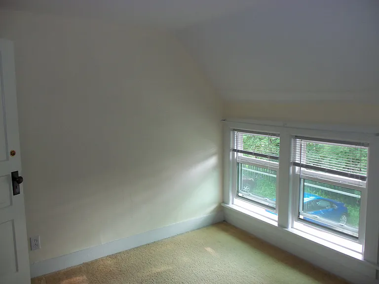 bedroom fits queen bed and dresser, small closet