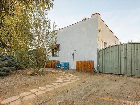 Front view of property with 2 parking spaces