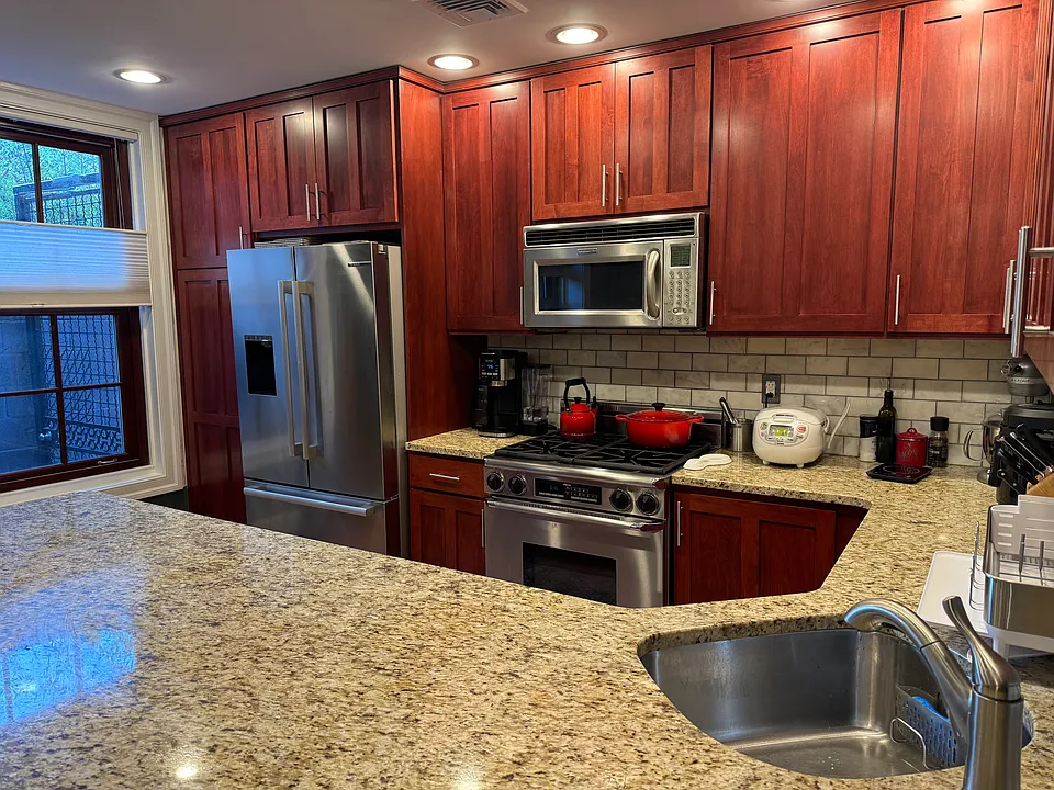 Bosch refrigerator, Dacor oven, KitchenAid Microwave with range venting to the outside