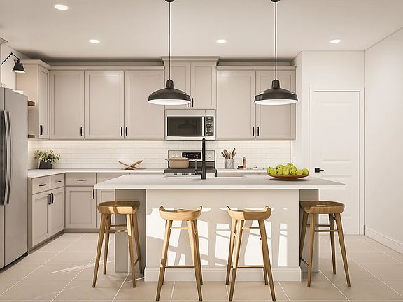 Kitchen with center island and pendant lighting