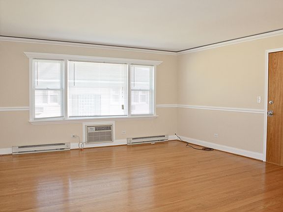2nd image of 5041 N East River Rd APT 2B