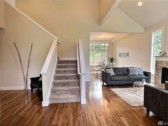 Light and bright entryway with Vaulted ceilings.