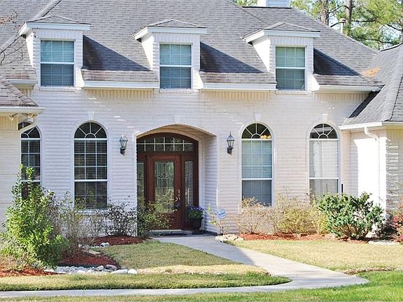 Gorgeous Front Elevation has lots of Curb Appeal!! Notice the Fully Landscaped Front Yard & Trees.... Easily Maintained by Your Full Sprinkler System...