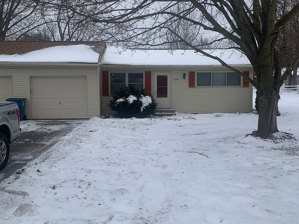 Street view with attached garage. 11 x 21 with garage door opener.