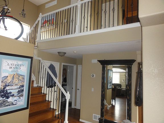 hardwood stairs to upper level