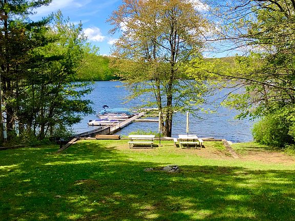 Private beach and picnic area - docks have swimming access, and beach is below.