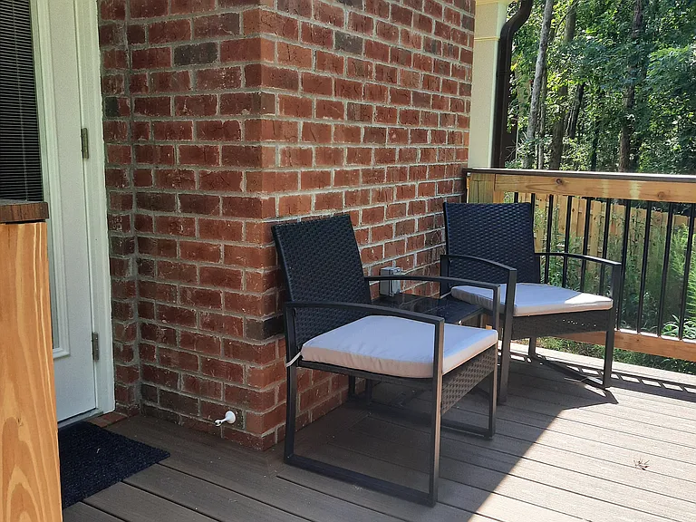 Outside rear raised forest deck.