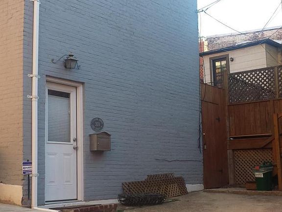 2 Story Carriage House. Main Alley Entrance.