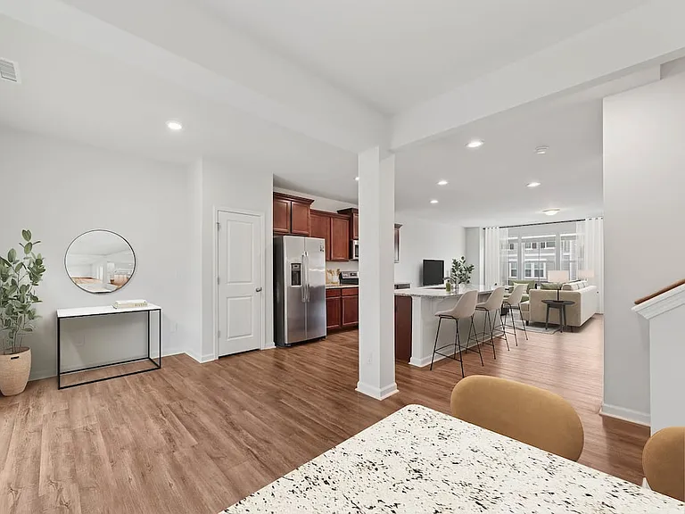 Classic Package Kitchen, living, and dining areas with hard-surface vinyl plank flooring