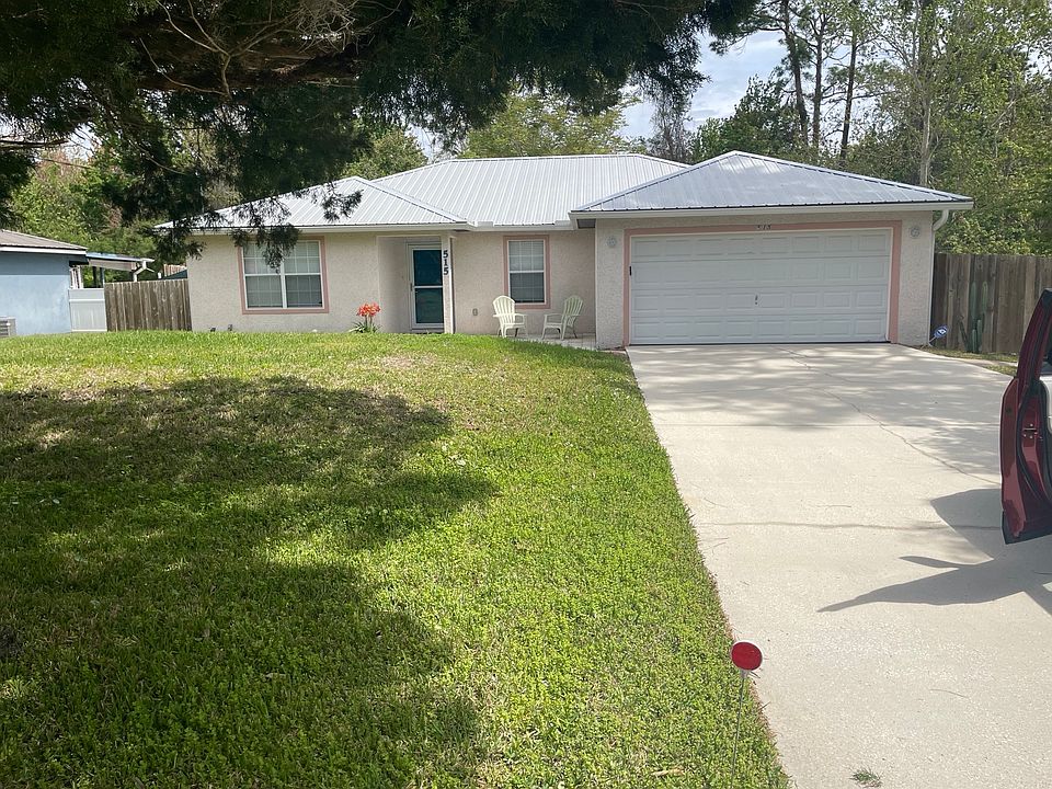 Front view - 2 car garage & ample parking