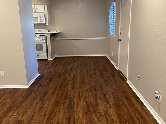 Dining Area next to Kitchen large enough for a table with 4 chairs