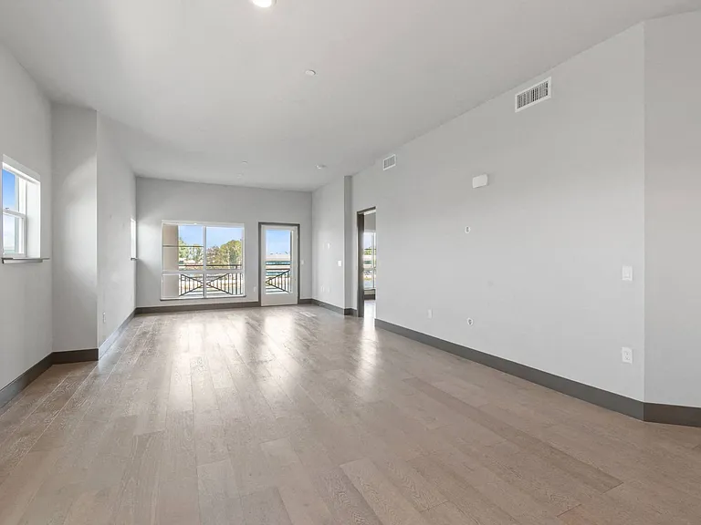 Open concept floor plan with high ceilings